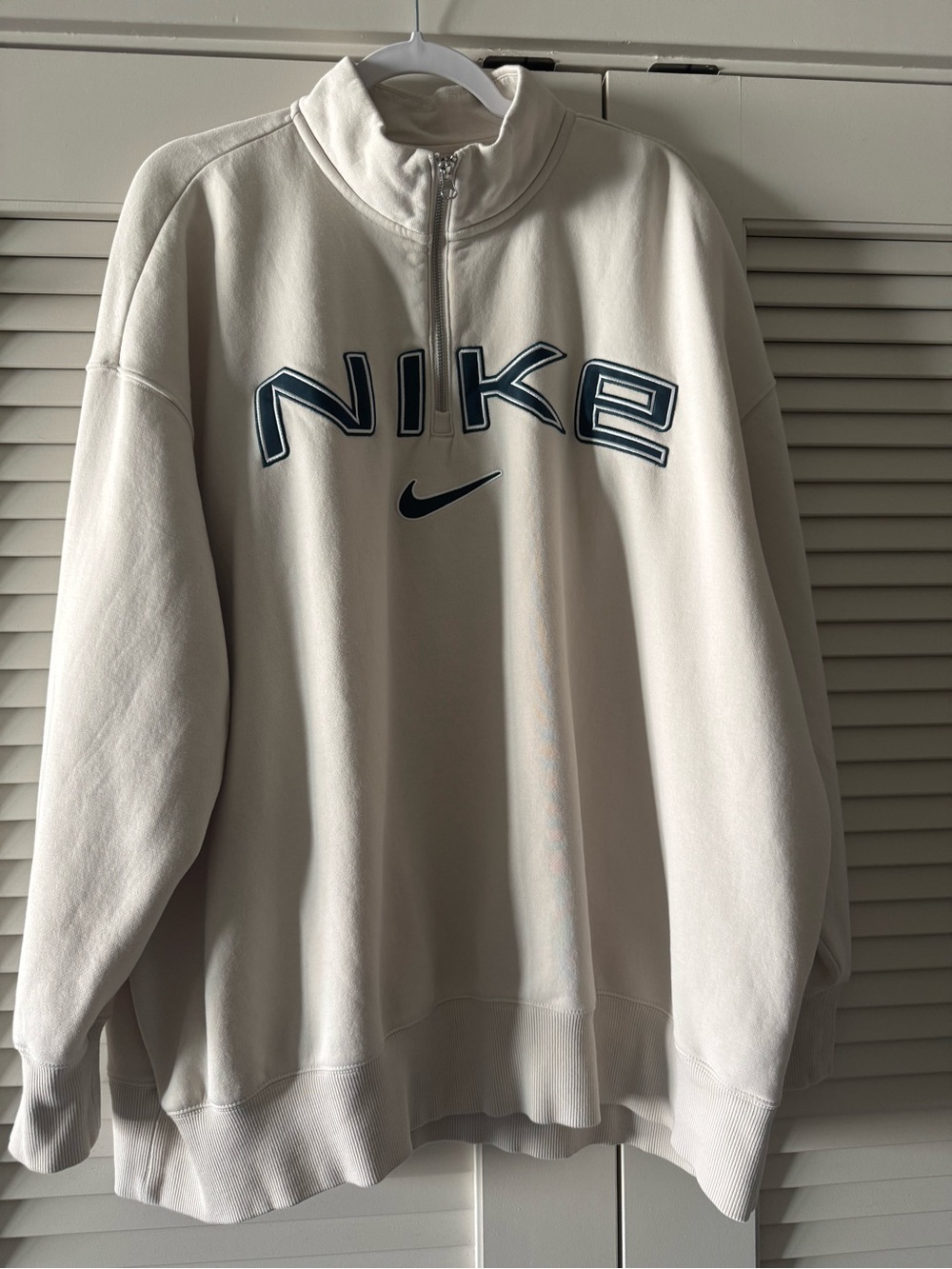 Nike Cream Quarter-Zip Pullover with Navy Logo